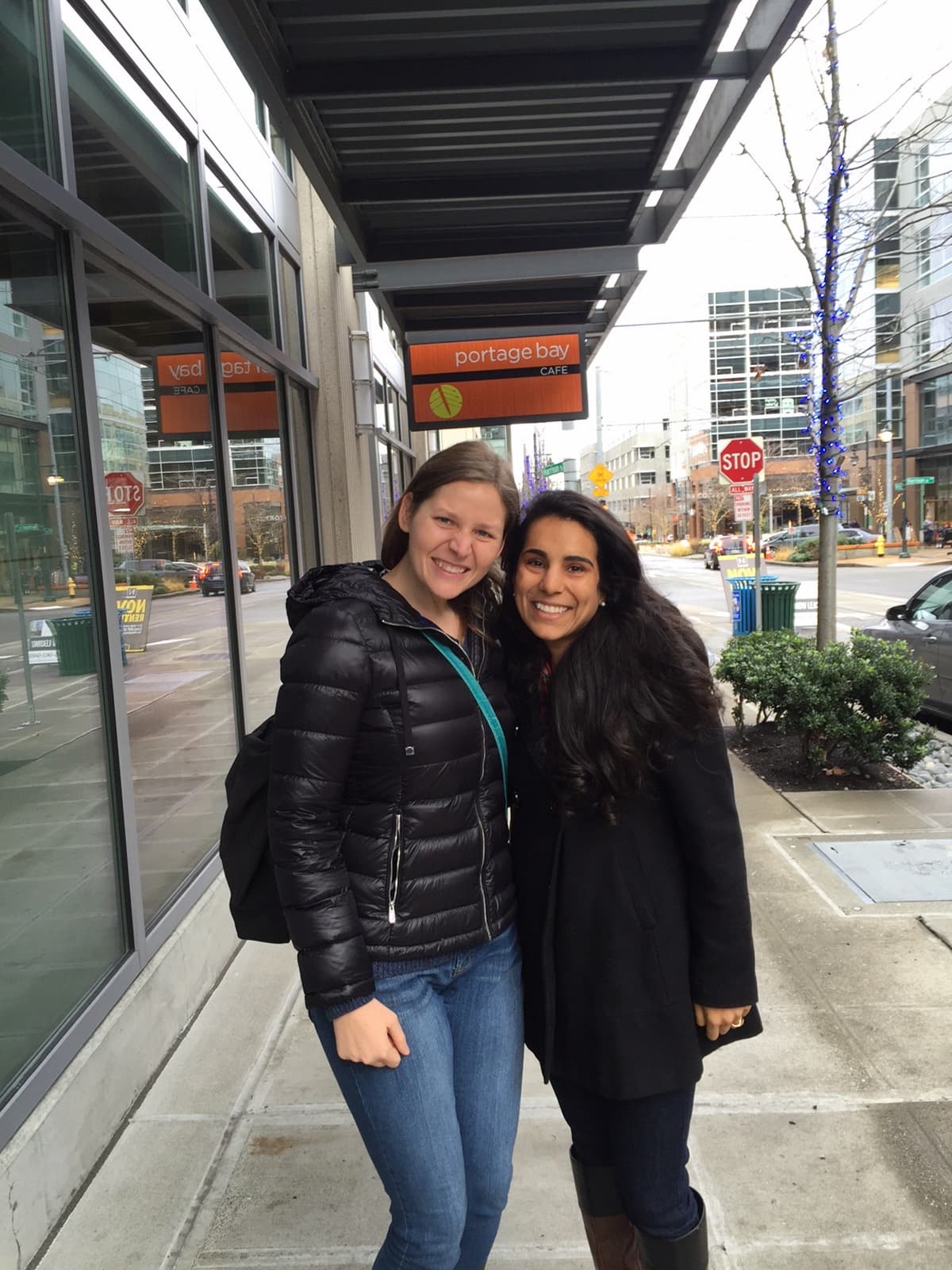 Two best friends on a sidewalk smiling for the camera - Choosing to pursue meaningful friendships even when it feels uncomfortable